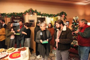 Annual Meeting and Holiday Party mingling
